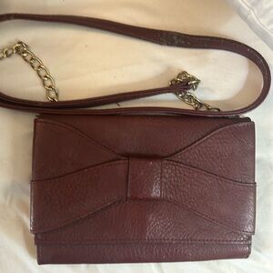 Zac Posen Burgundy bag with chain strap.